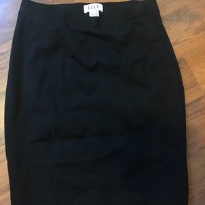 Elle black pencil skirt. Pull on, stretchy, thick